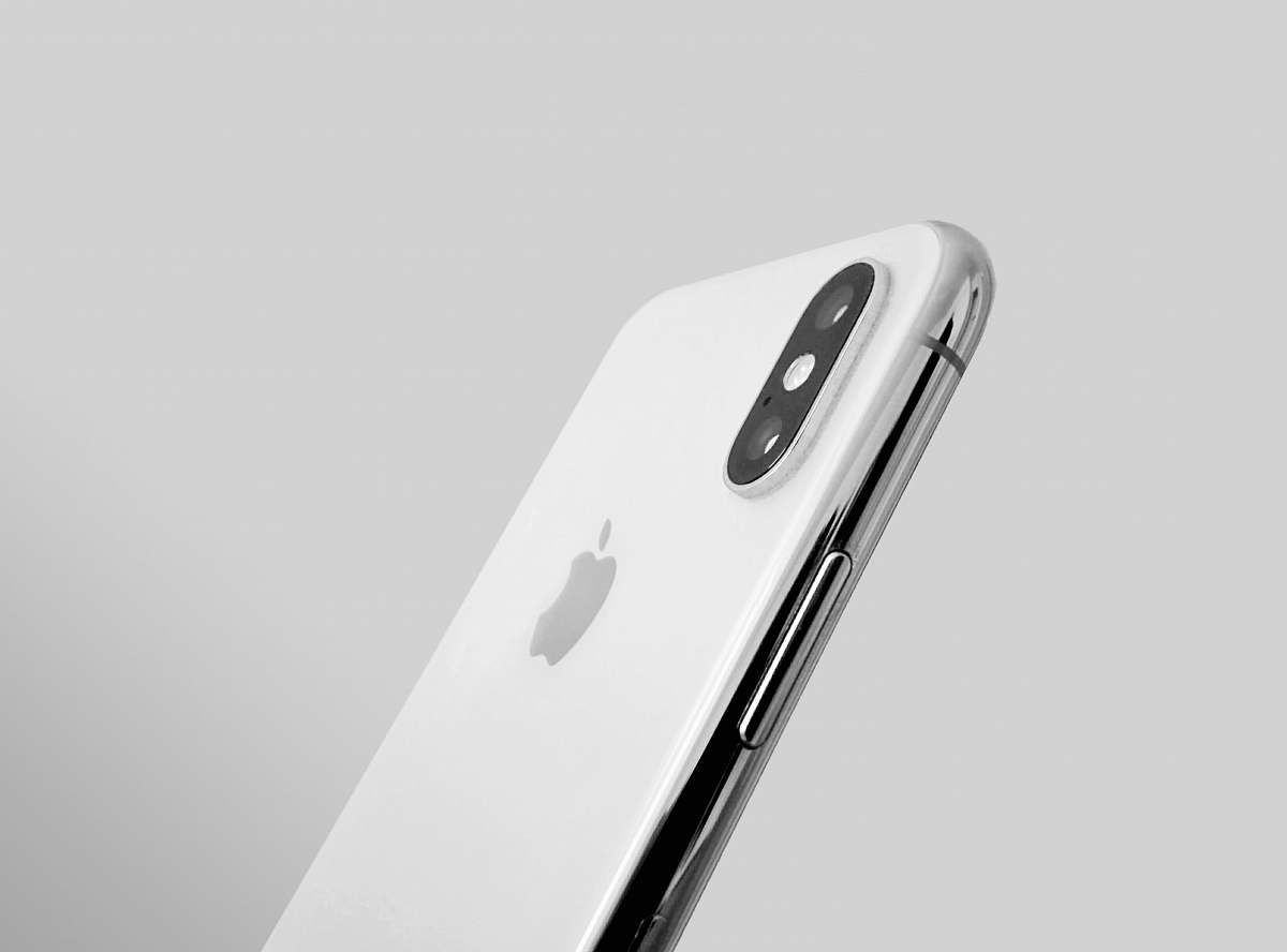 cell phone silver iPhone X mobile phone